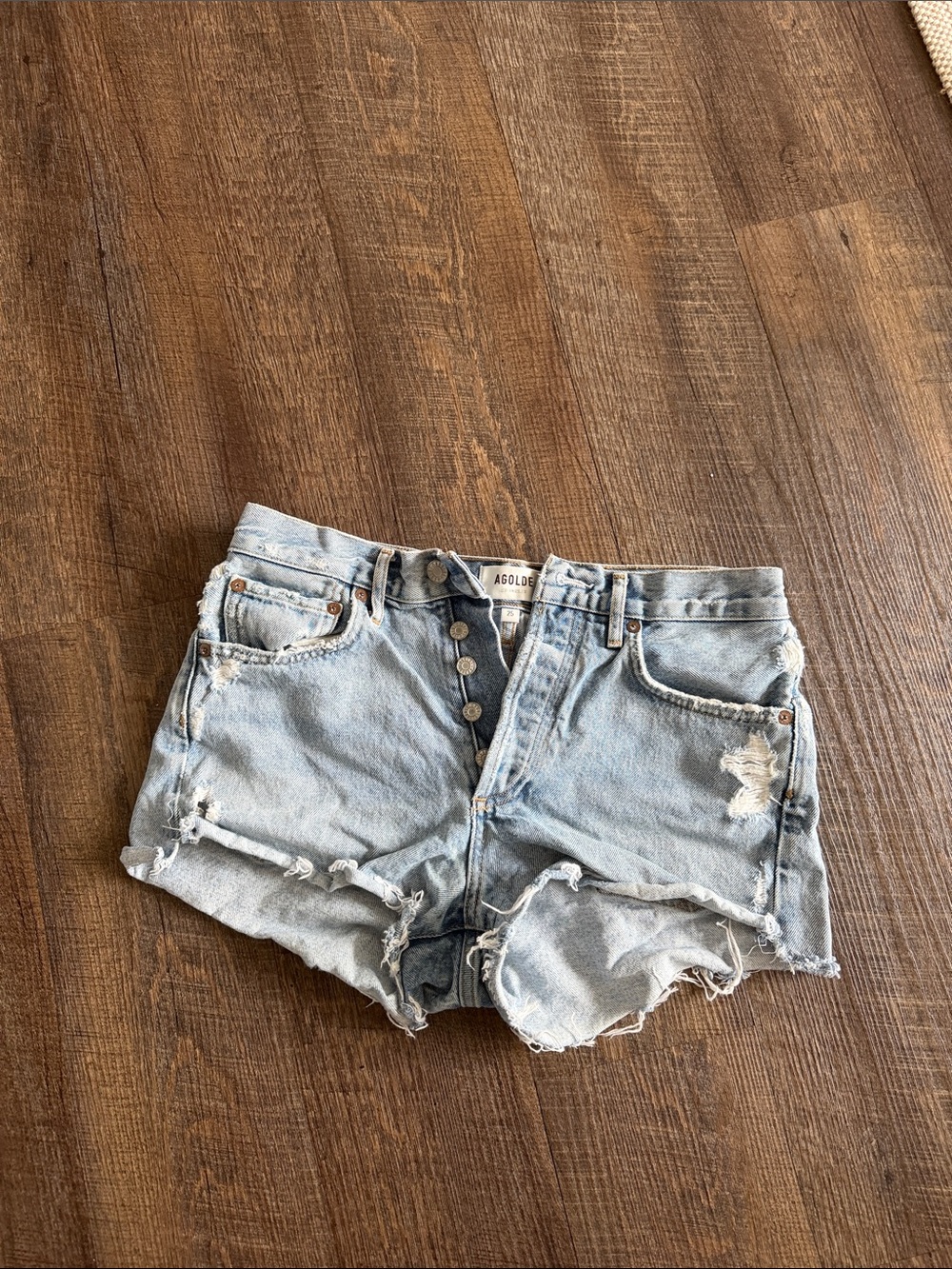 Agolde Faded Light Blue High-Rise Distressed Denim Shorts